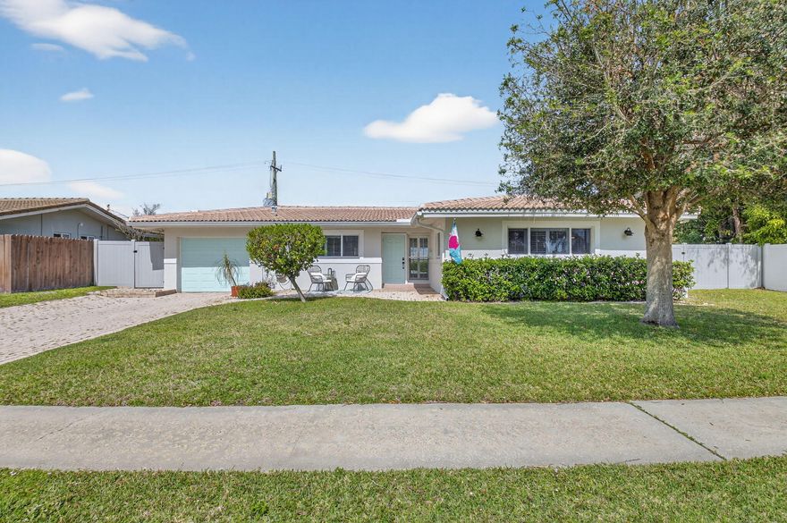 In  the heart of East Boca's sought after Boca Square, this charming 2-bedroom, 2-bath home sits on one of the largest lots in a quiet, pet-friendly neighborhood. Just a short 5 minute walk to the highly rated Addison Mizner K-8 School and less than 3 miles from Mizner Park, Sugar Sand Park, Brightline, I-95, and Boca's stunning beaches, this location offers convenience and lifestyle. Step inside to a bright, open floor plan featuring luxury vinyl plank flooring and fresh interior and exterior paint, creating a modern and inviting atmosphere. Updated kitchen boasts stainless steel appliances, granite countertops, and sleek cabinetry, perfect for everyday living and entertaining. Hurricane impact windows and sliders, along with accordion shutters, provide peace of mind and added security Enjoy your private outdoor oasis fully enclosed with new vinyl fencing, complete with a heated saltwater pool and spa, new pool equipment, lush landscaping, and a spacious patio ideal for relaxing or hosting guests. This move-in-ready, low-maintenance home also offers room to park your boat.

Don't miss this exceptional opportunity to own a beautiful home in a prime East Boca location with no HOA fees!