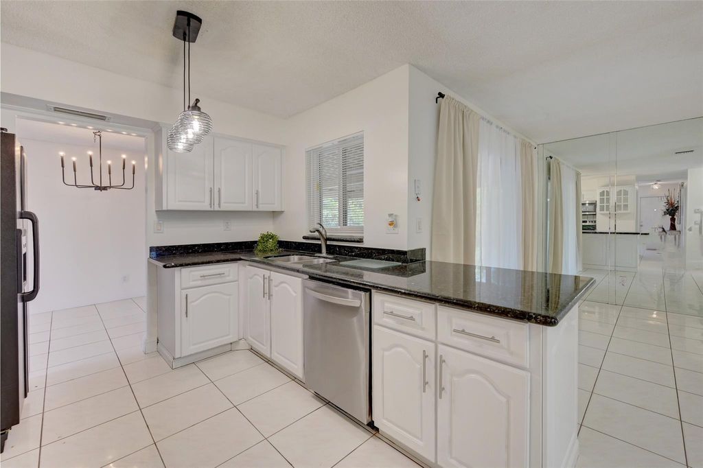 Photo of 2306 NW 98th Lane, Coral Springs, FL 33065 (MLS # F10407483)