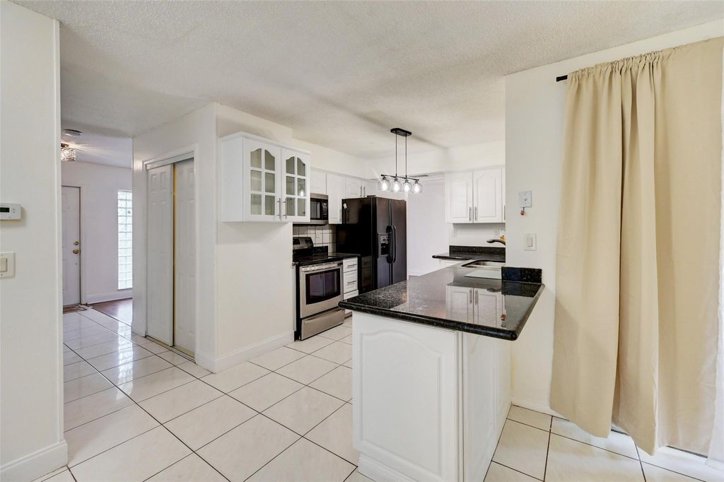 Photo of 2306 NW 98th Lane, Coral Springs, FL 33065 (MLS # F10407483)