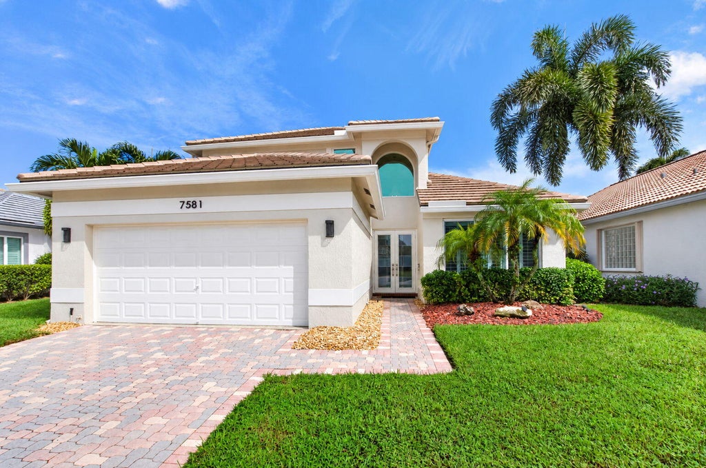 Photo of 7581 DOUBLETON Drive, Delray Beach, FL 33446 (MLS # B26078579)
