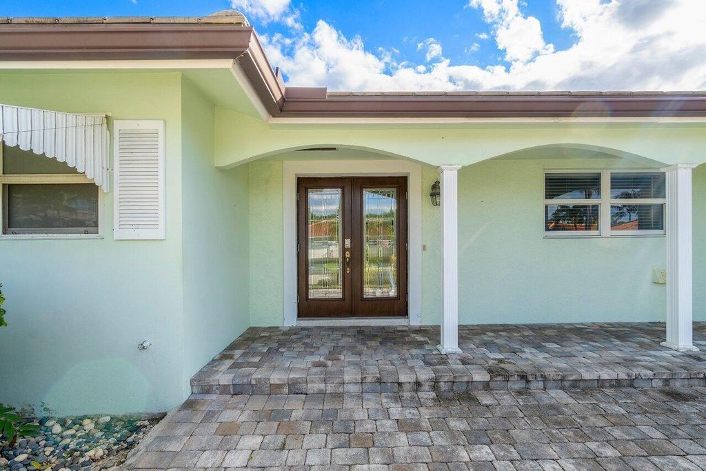 Photo of 1241 Emerald Drive, Singer Island, FL 33404 (MLS # R11110581)