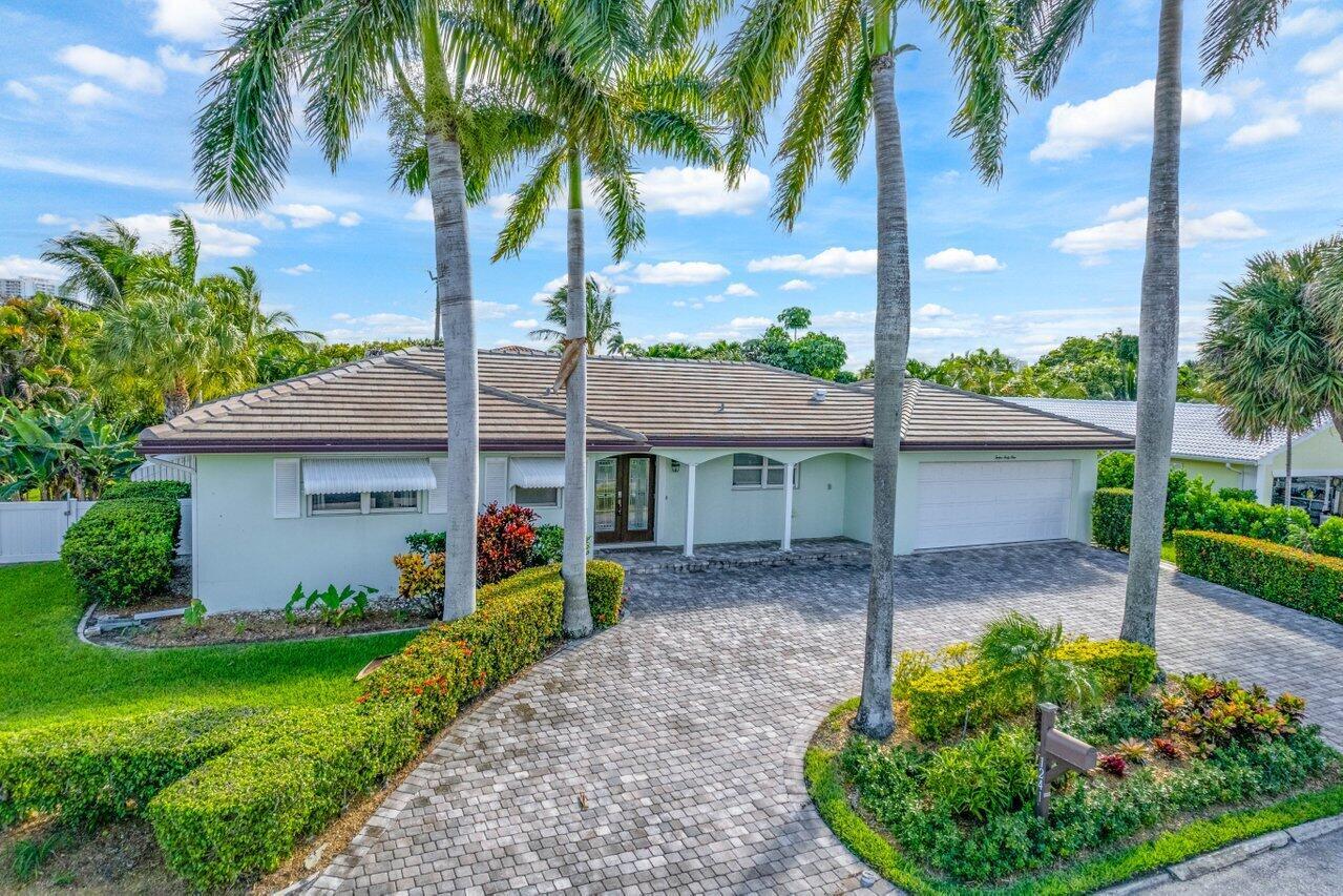 Coastal charm in the heart of Singer Island. Walk to public beach access, via Ocean Reef Park, in less than five minutes. Enjoy your own private pool, covered patio, and lush tropical landscaping in this slice of paradise. Complete set of hurricane impact windows, newer roof, updated bathrooms, and fresh paint. Minutes to Singer Island restaurants and shopping.
