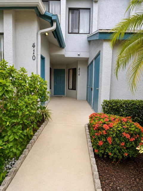 Photo of 404 HARBOUR POINTE Way, Greenacres, FL 33413 (MLS # B26059911)