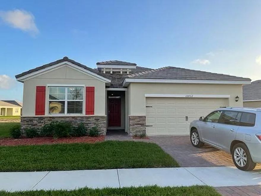 Move in SPECIAL!!!! REACH OUT TO FIND OUT MORE INFO!!!!Stunning 4BR/2.5BA DR Horton home with lakefront views in gated ''The Estates'' at The Preserves, just 2 miles from downtown Tradition.Renovated May 2025: new flooring, interior paint, granite vanities, crown molding, and added half bath. Over 2,000 sq ft + 400 sq ft garage and 220 sq ft screened lanai with Ox Floors coating. Open layout, quartz counters, walk-in pantry, high ceilings, new washer/dryer. Master suite with dual closets and large ensuite. HOA includes lawn care, pool, dog park, and trails. Security system & phone line included. Pets allowed w/approval.  Available now!