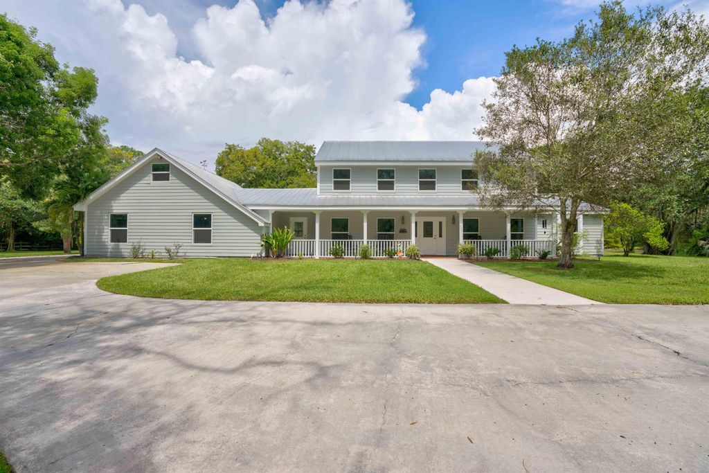 Photo of 10719 Randolph Siding Road, Jupiter, FL 33478 (MLS # R10921380)