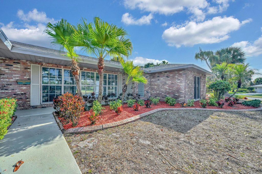 Photo of 1704 SE Adair Road, Port Saint Lucie, FL 34952 (MLS # R11157817)