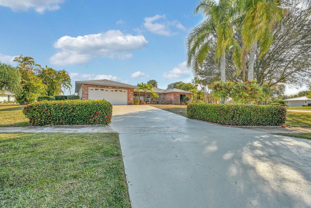 Photo of 1704 SE Adair Road, Port Saint Lucie, FL 34952 (MLS # R11157817)