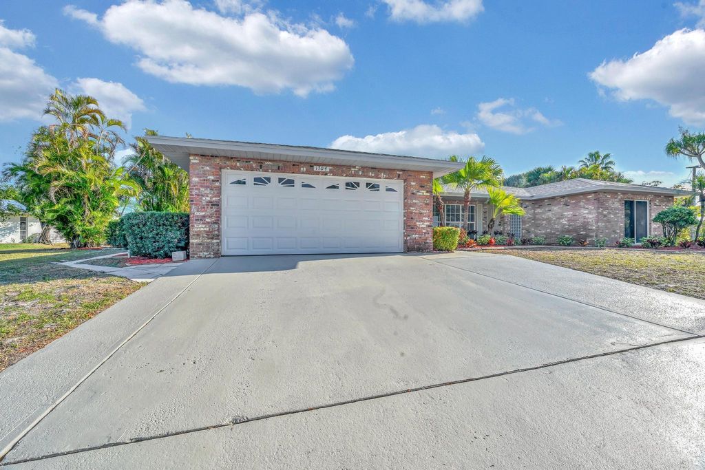 Photo of 1704 SE Adair Road, Port Saint Lucie, FL 34952 (MLS # R11157817)