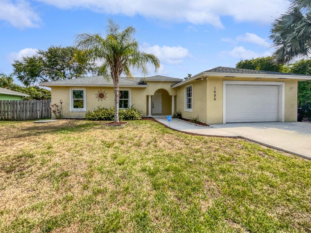 Photo of 1686 SW Meridian Avenue, Port Saint Lucie, FL 34953 (MLS # R10987029)