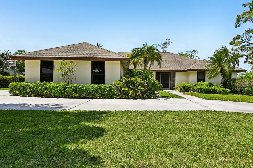 Welcome to your private oasis in the highly sought-after Meadow Wood community of Wellington! Situated on over half an acre, this beautifully maintained 3-bedroom + office, 2-bathroom pool home offers the perfect blend of space, comfort, and South Florida living. From the moment you arrive, the circular driveway & new hurricane-impact windows elevate both curb appeal and peace of mind. Inside, you'll find a bright, open layout featuring a spacious kitchen with granite countertops, white cabinetry, and a walk-in pantry, perfect for everyday living & entertaining. Step outside to your backyard retreat, complete with a sparkling pool and spa, expansive green space, and plenty of room to relax or host gatherings year-round. Prime location near A-rated schools, world-class equestrian venues.