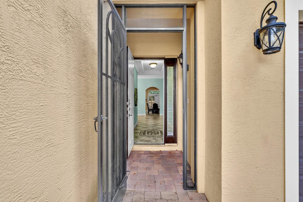 Photo of 10247 Isle Wynd Court, Boynton Beach, FL 33437 (MLS # B26092466)