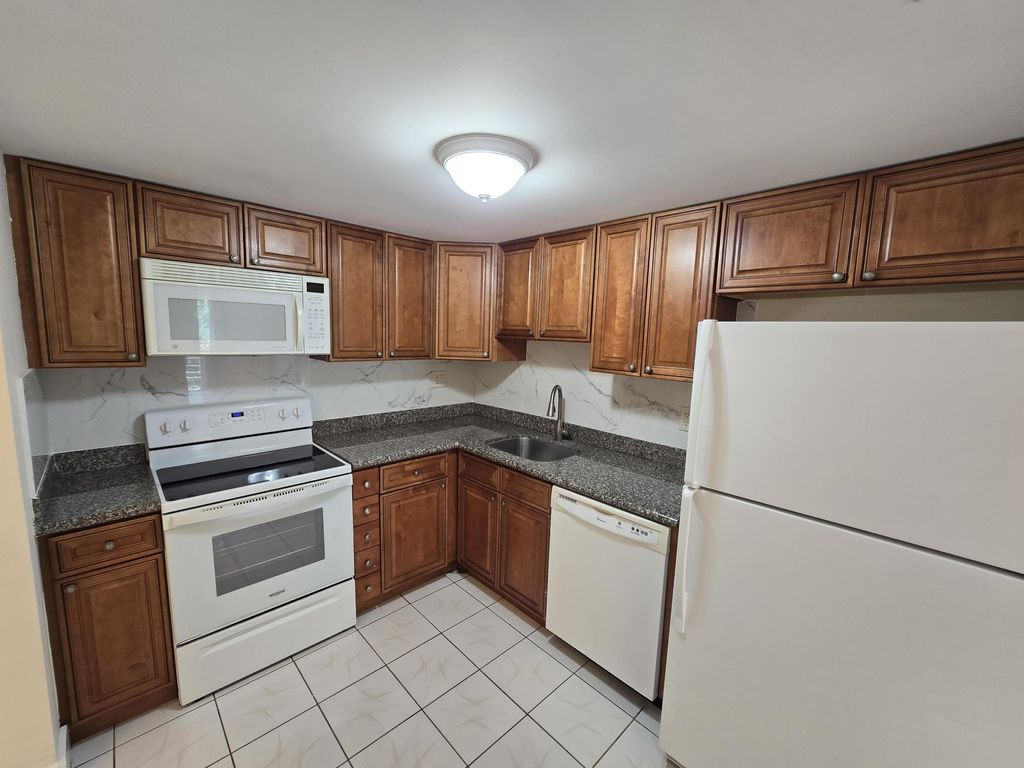 Photo of 4304 NW 9th Avenue #1-3b, Deerfield Beach, FL 33064 (MLS # B26019561)