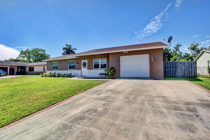 Imagine yourself grillin' and chillin' in the Tiki Hut overlooking the canal or taking a dip in the crystal clear swimming pool on a beautiful day. This 3 Bedroom 2 Bath pool home had impact windows and doors installed and fresh paint completed just over a year ago. The over-sized lot is fully fenced and offers privacy from your neighbors and a safe space for your furry friends. There's room for a boat or RV and no HOA!!