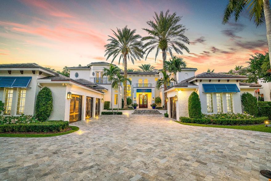 Waterfront Estate Home with over 112' of water frontage.  This renovated home boasts large bedrooms with private baths, 4 car garage, master suite with his and hers everything, sitting room overlooking the outdoors.  If you like to enjoy the Florida Lifestyle...this loggia and pool area are perfect for you.