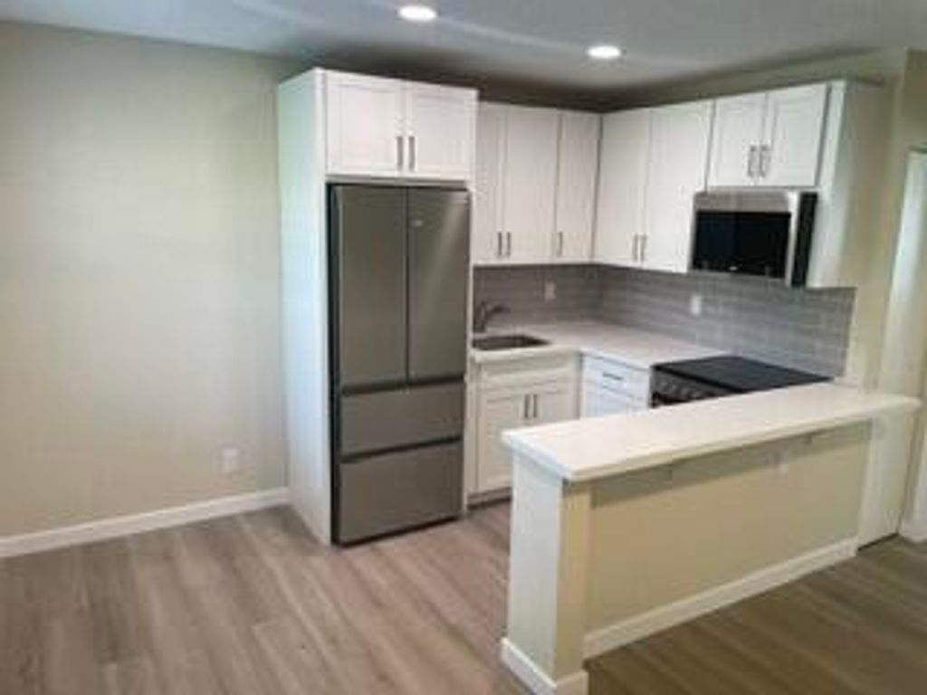 Photo of 5168 NE 6th Avenue #431, Oakland Park, FL 33334 (MLS # B26035401)