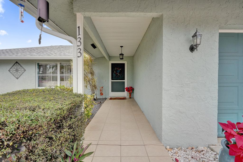 Photo of 133 NE Fatima Terrace, Port Saint Lucie, FL 34983 (MLS # R11154285)