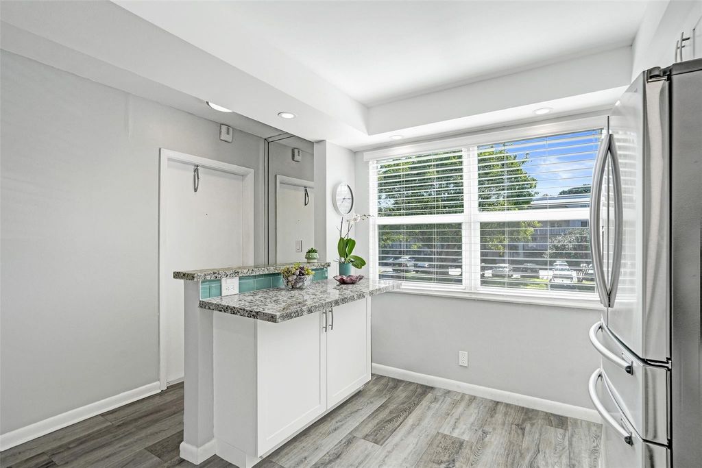 Photo of 2003 Granada Drive #A2, Coconut Creek, FL 33066 (MLS # F10551779)