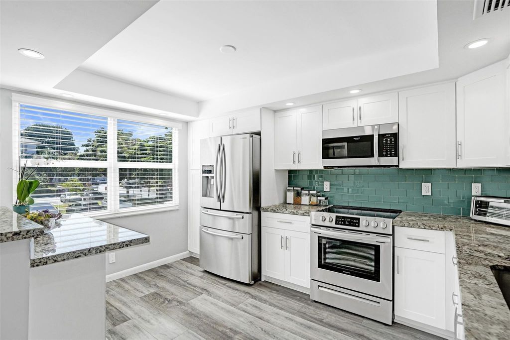 Photo of 2003 Granada Drive #A2, Coconut Creek, FL 33066 (MLS # F10551779)