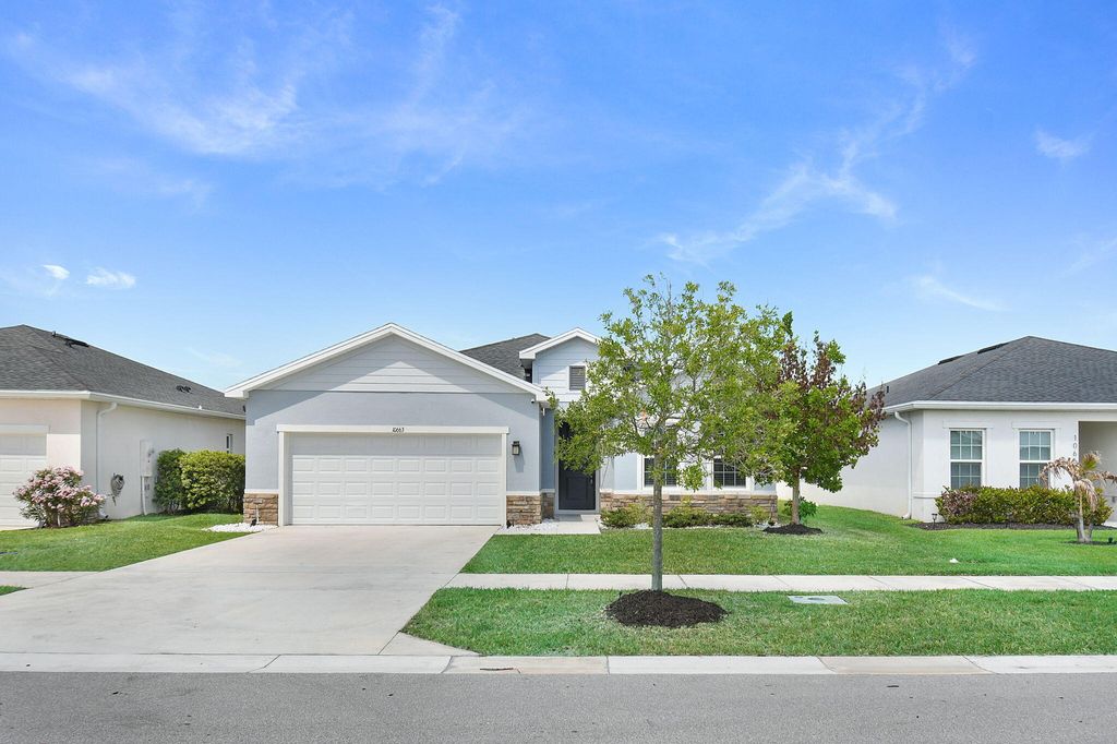 Photo of 10663 SW Vasari Way, Port Saint Lucie, FL 34987 (MLS # B26021242)