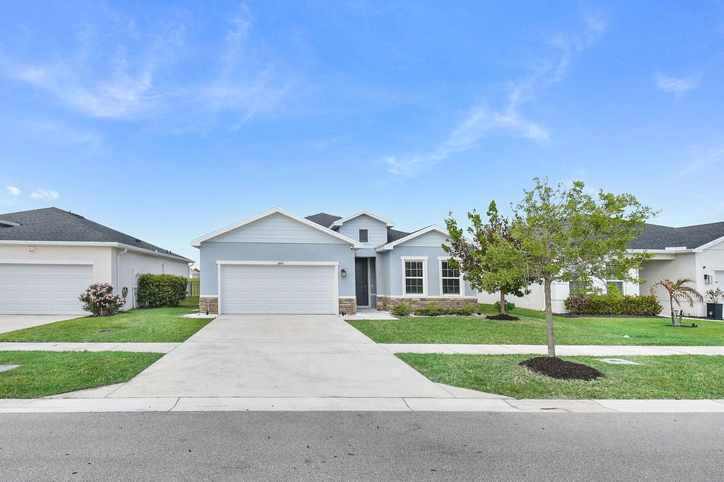 Photo of 10663 SW Vasari Way, Port Saint Lucie, FL 34987 (MLS # B26021242)