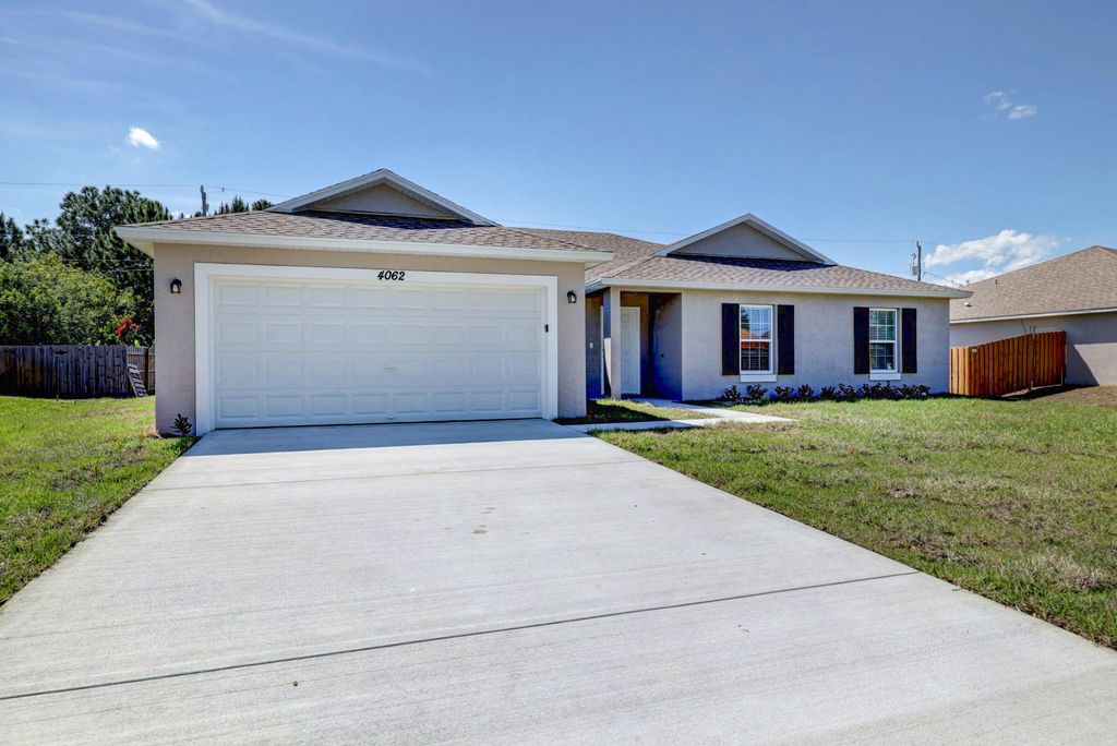 Photo of 361 SW Log Drive, Port Saint Lucie, FL 34953 (MLS # R10978858)