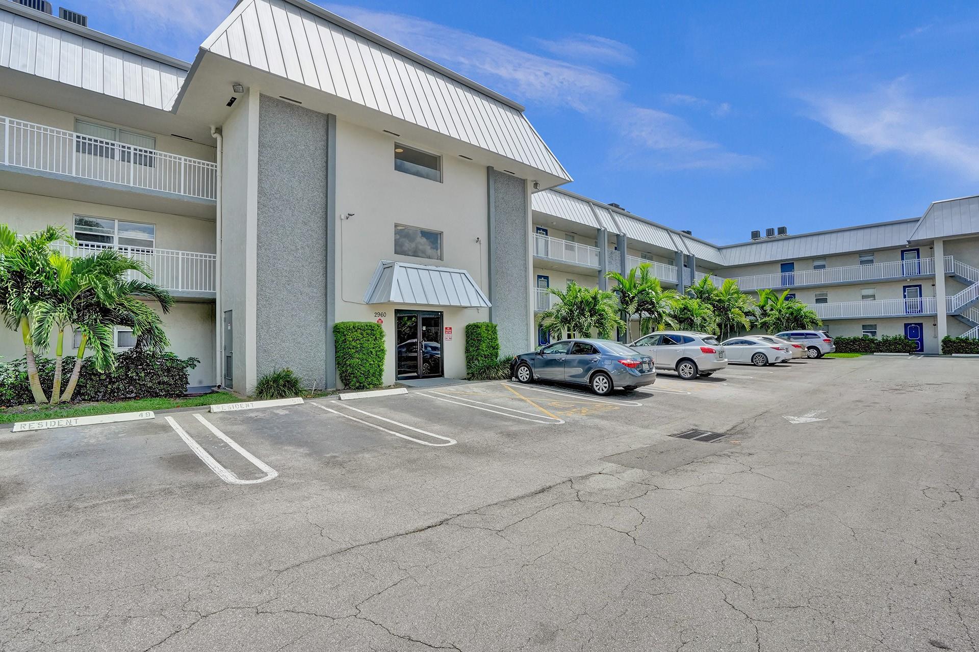 Spacious 2/2 Condo with Beautifully Remodeled Bathrooms and a Large Screened-In Balcony Overlooking the Community Pool. Open-Concept with just under 1200sq ft Under Air. Community Features a Community Pool and Tennis Courts. One Assigned Parking Spot with Plenty of Guest Parking Available. Rent Includes Water, Sewer & Trash. Conveniently Located within 5 minutes of The Walk and The Coral Square Mall. 650+ Credit Score Required by the Association. Vacant and Easy to Show.