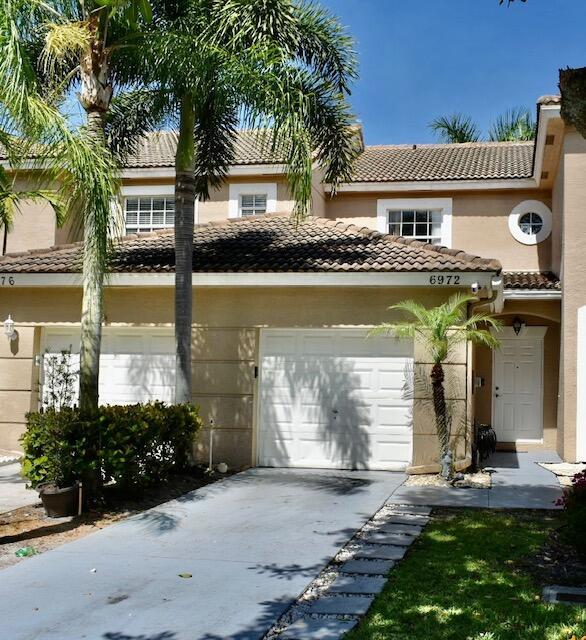 Beautifully Maintained Townhouse in Highly desirable Smithbrooke Community! This 2 bedroom, 2.5 bathrooms, 1 car garage includes Open Foyer, stainless steel appliances in the kitchen. Open Floor plan, Vaulted ceiling. Two Primary Bedrooms with on suite bathrooms and walk in closet. Available May 15th.Resort Style amenities : Clubhouse, Pool with Hot Tub, and Fitness area. Great central location. Close to shopping, restaurants, beach, I-95, and Turnpike.