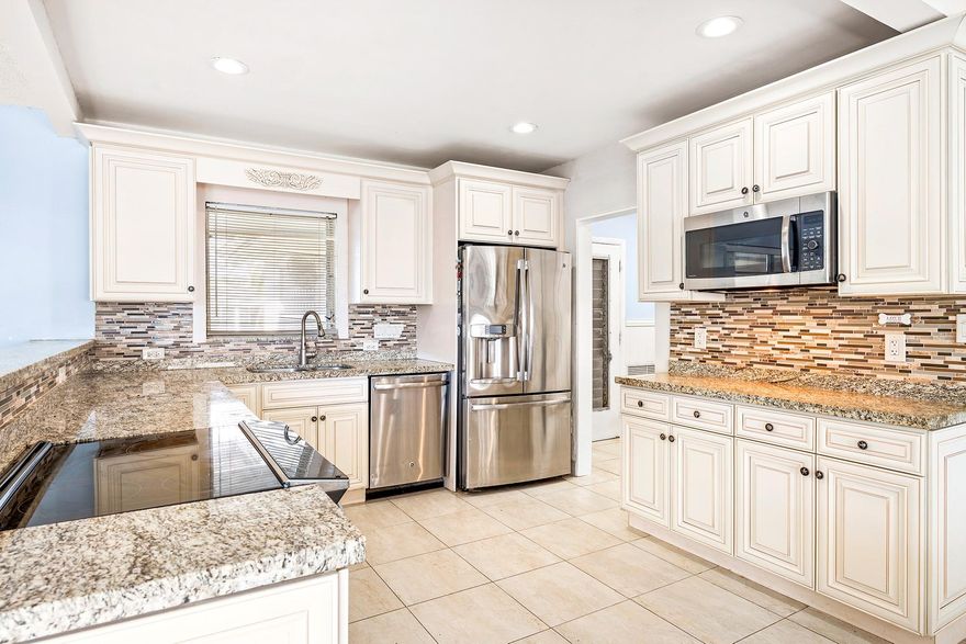 Welcome to this spacious 3 bedroom 2 bath home in the desirable neighborhood of Coral Ridge Isles featuring a 2005 tile roof, a two-car garage, circular driveway, new electrical panel, new water heater and a comfortable open floor plan layout with natural light. The kitchen and bathrooms have been updated, and the enclosed Florida Room provides additional living space along with a separate 6x12 storage room. The fenced backyard offers privacy and room for a pool. The home also includes a laundry room, ceiling fans and an automatic sprinkler system. Conveniently located near beaches, shopping and restaurants.