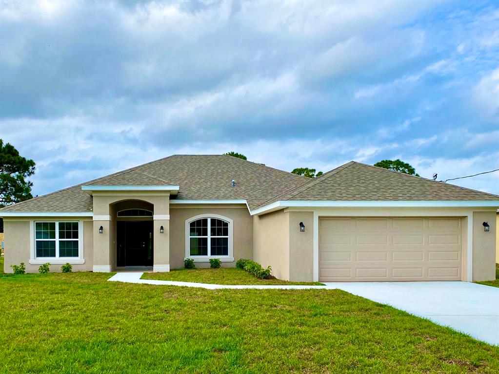 Photo of 1681 SW Salvatierra Boulevard Blvd, Port Saint Lucie, FL 34953 (MLS # R10820104)