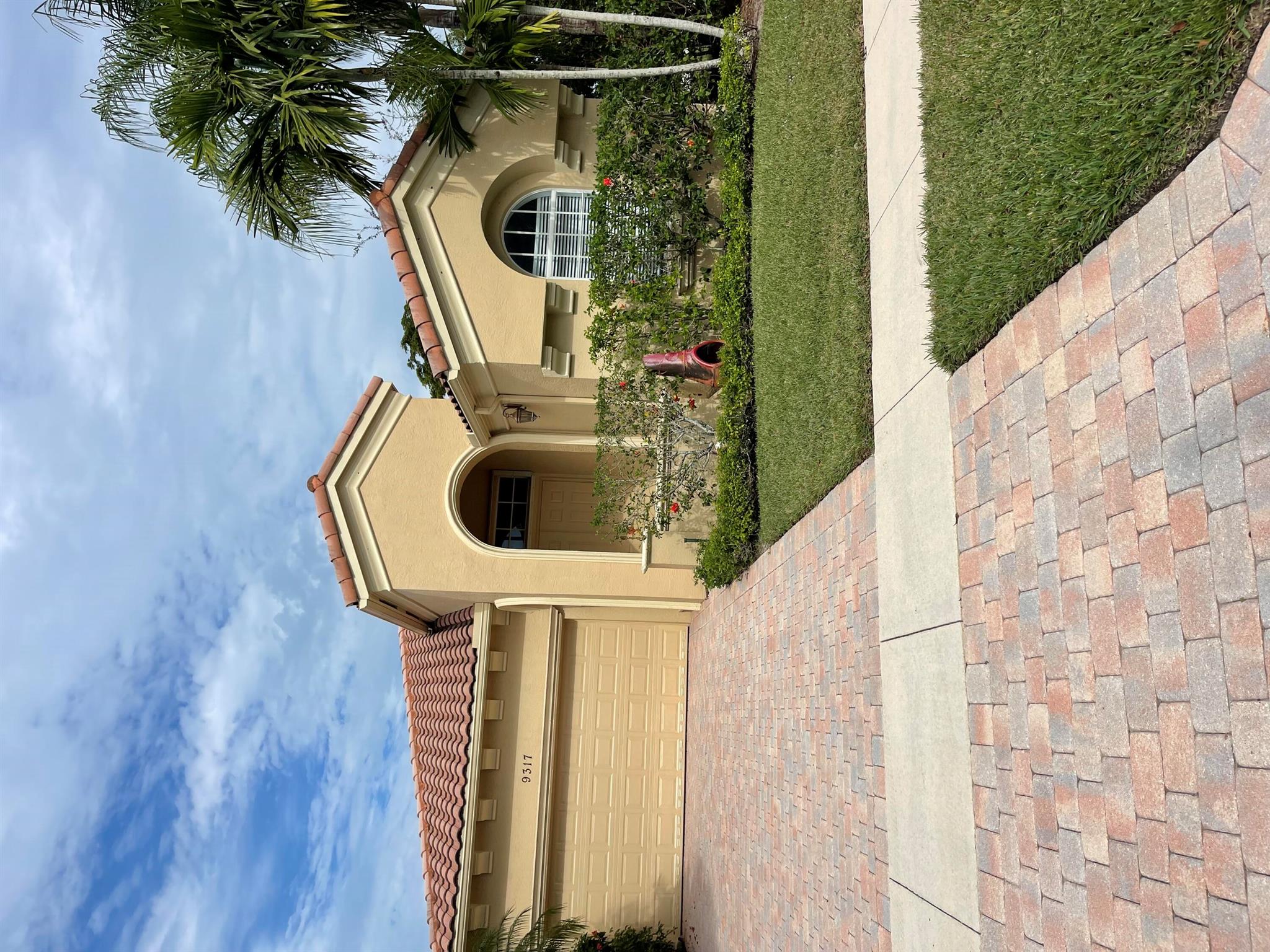 Single Story house with lake view in gated 55+ community. Close to the Wellington Mall, restaurants and highways.