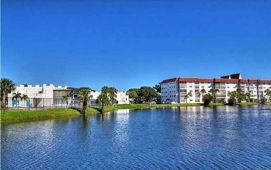 Welcome to life of Luxury and Convenience in this bright beautifully updated and furnished one Bedroom one and a half Bath waterfront Condo located on the 3rd floor of 4 story building. The water view is amazing from the Florida room and bedroom. Updated Bathrooms and Kitchen with Granite counters. Beautifully tiled floors.. Enjoy the large clubhouse, 3 heated pools, Bowling, Gym, Billiards, Steam, and Sauna..Courtesy Bus for easy shopping. Close to grocery stores other shopping, and a short ride to Sawgrass Mall and the beaches.