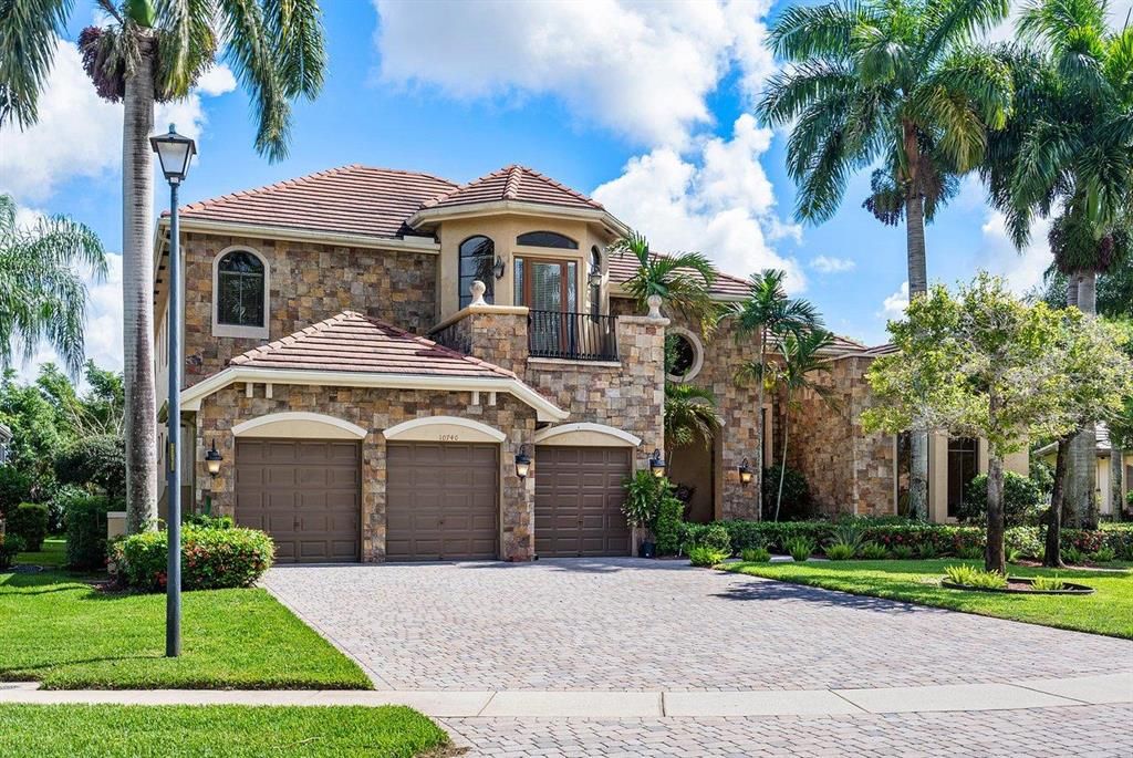 Photo of 10740 Versailles Boulevard, Wellington, FL 33449 (MLS # R10728802)