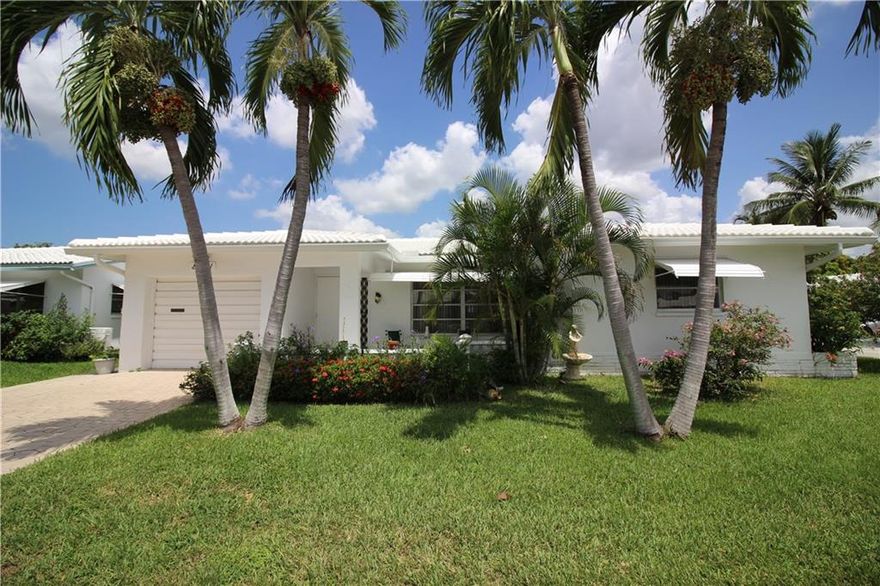 Beautiful 2-Bedroom, 2-Bathroom Home with a 1-Car Garage! Tile Throughout. New Tiled Roof in 2017! Extremely Clean & Well Maintained. Large Bedrooms. Master has a Huge Walk-in Closet & 2nd Bedroom has 2 Closets. Large Enclosed Florida Room Out Back. Enclosed Laundry / Utility Room in Garage. Corner Lot. Nice, Secluded & Quiet Section of Sunset Isle in Tamarac (Mainlands Section 13) which is a 55+ Housing for Older Persons Community. Nice Clubhouse & Community Pool. Low HOA Fee. Come See This One Fast!