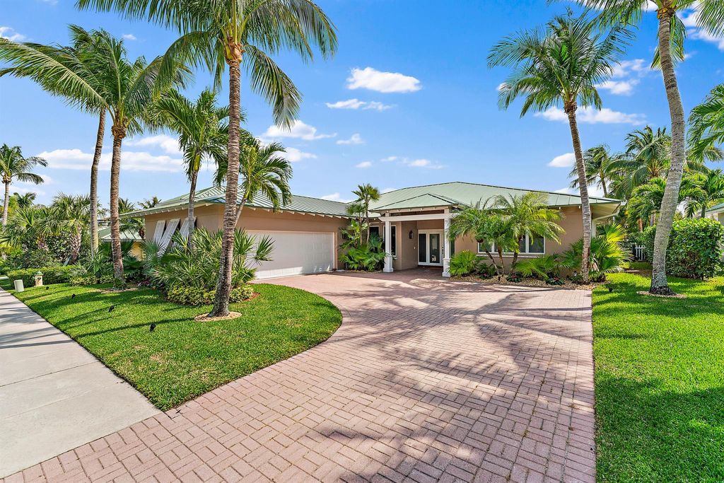 Photo of 28 Coconut Lane N, Tequesta, FL 33469 (MLS # R10971117)