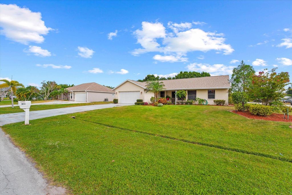 Photo of 799 SE Fallon Drive, Port Saint Lucie, FL 34983 (MLS # R10993610)