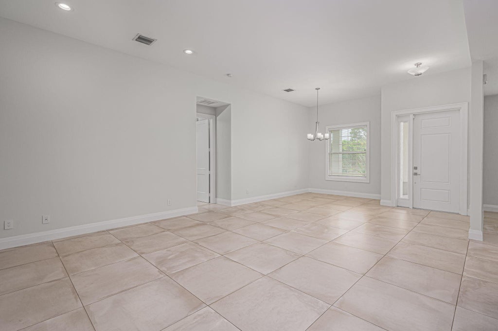 Photo of 4449 SW Gainsboro Street, Port Saint Lucie, FL 34953 (MLS # R10966455)