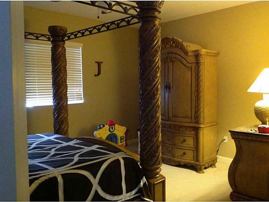 Nice corner lot unit within this Townhome community. Sits with the backyard facing the park. This tastefully upgraded home features a large kitchen with wood cabinets and upgraded tile bathrooms. Home in immaculate condition!