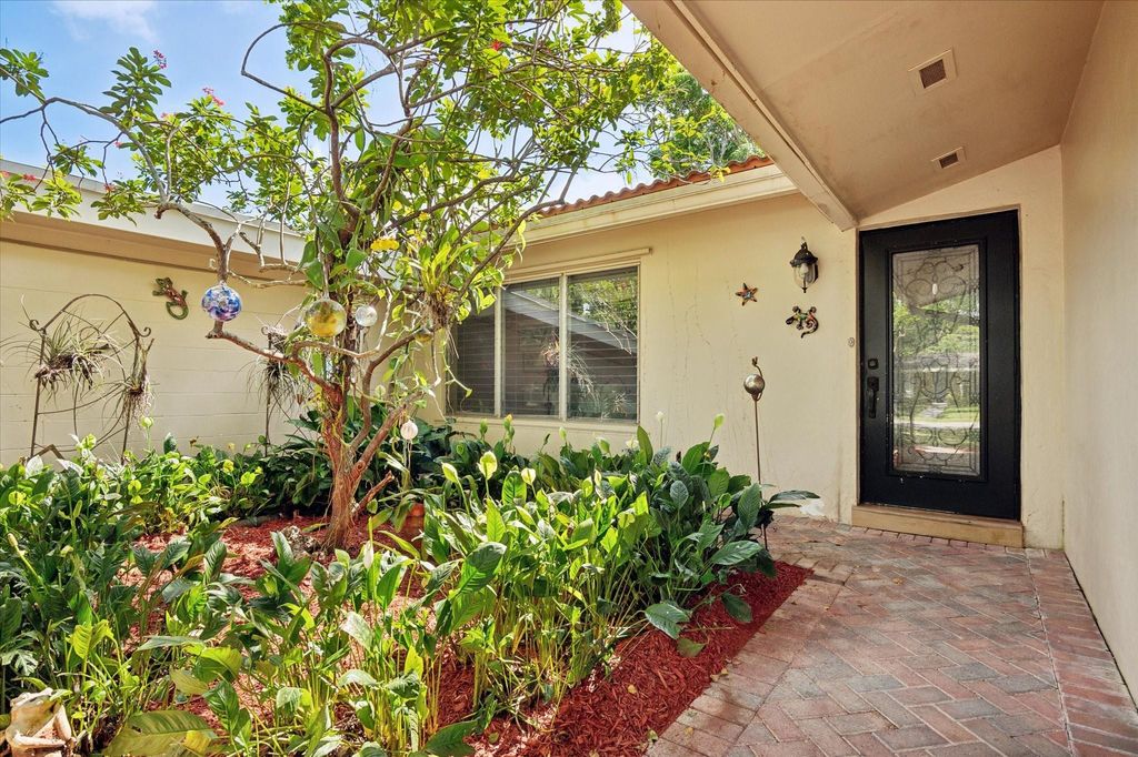 Photo of 840 Gardenia Lane, Plantation, FL 33317 (MLS # F10453174)