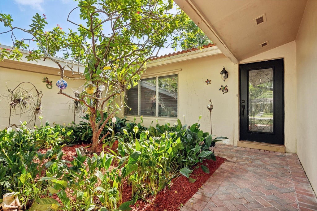 Photo of 840 Gardenia Lane, Plantation, FL 33317 (MLS # F10453174)