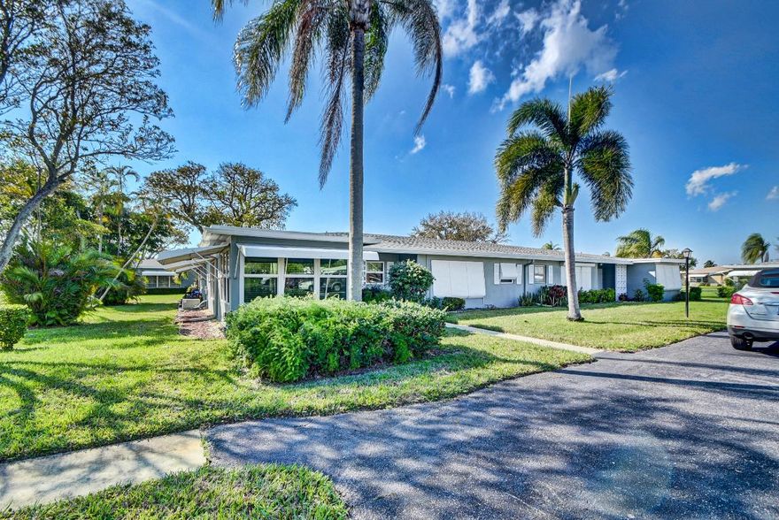 Great location of this remodeled 2BR/2BA corner villa. Nestled in an active 55+ community. Villa features: Hurricane impact windows, neutral tile flooring and carpet in bedrooms, updated kitchen with SS appliances, Newly updated electrical panel, roof is approx. 10 year old, AC 2007, Updated bathrooms, back yard patio here you can relax, bbq and entertain.  Offered turnkey, master bedroom bed/frame & headboard do not convey. Sellers need 60 day closing. Not pet friendly, however, medical necessity allowed with proper documentation. May rent after 2 yrs of ownership then only once per year 3 month min. Make this updated villa your new piece of paradise. Enjoy Florida living at its best in this very active 55+ community where you'll enjoy many planned social activities, game night, traveling large heated resort style pool and clubhouse and so much more. Located closed to all amenities, just minutes to the beach and downtown Delray where you'll discover quaint shops, open air cafes, fine restaurants, shopping malls, theater, close to I95/Turnpike and  Places of worship.  You'll find a coin operated washer and dryer in each building of 4 units. **All information is deemed reliable but not guaranteed and subject to change without notice. **