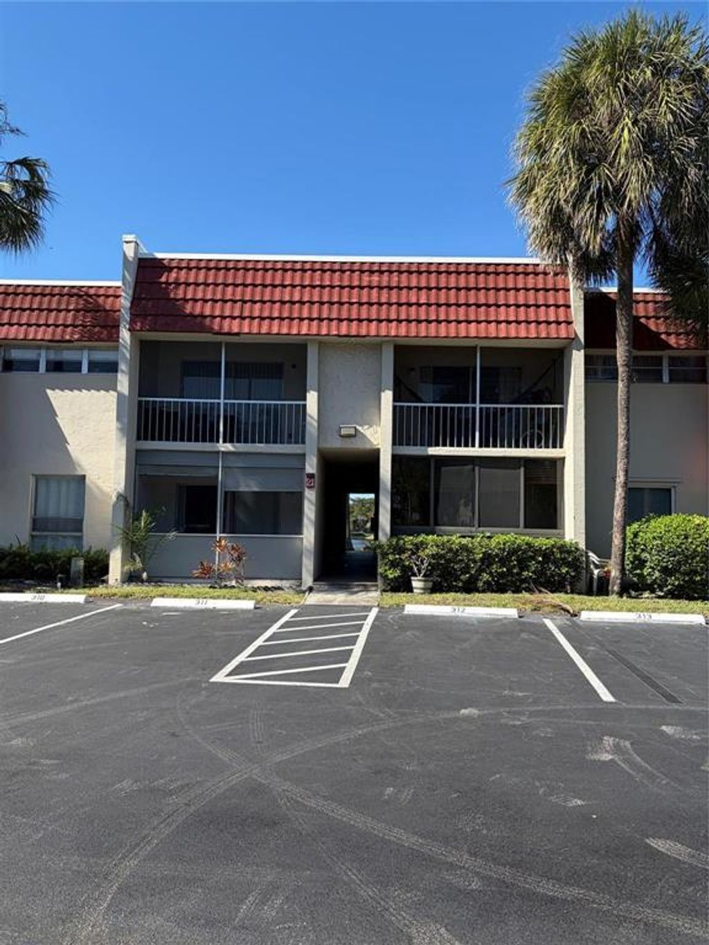 Photo of 21 Jacaranda Country Club Drive #224, Plantation, FL 33324 (MLS # B26023871)