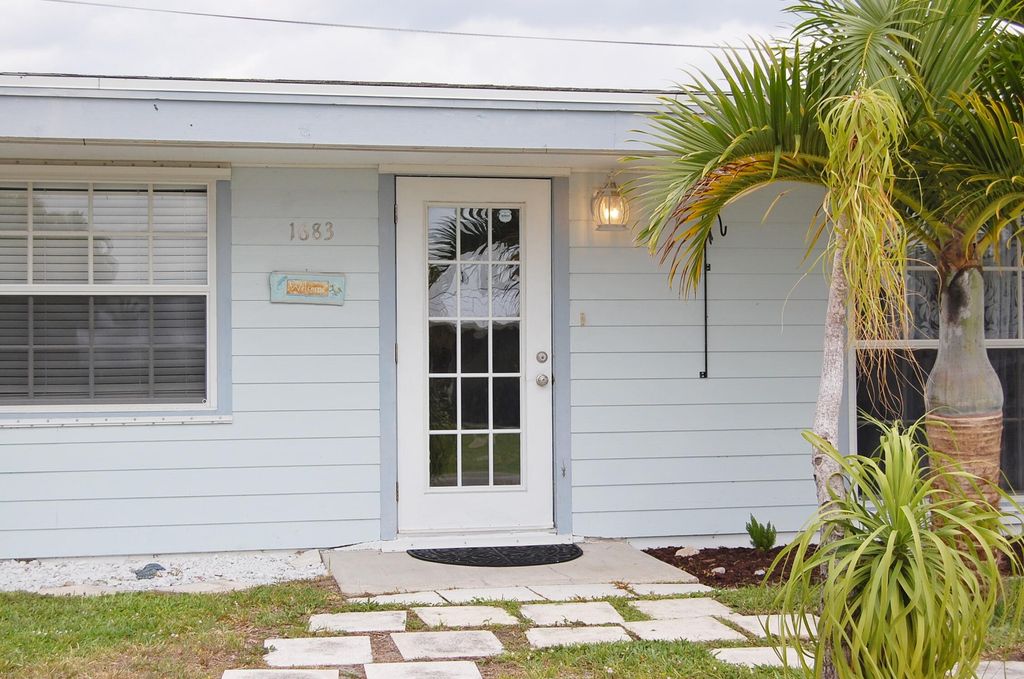 Photo of 1683 NE 24th Street, Jensen Beach, FL 34957 (MLS # R10974618)