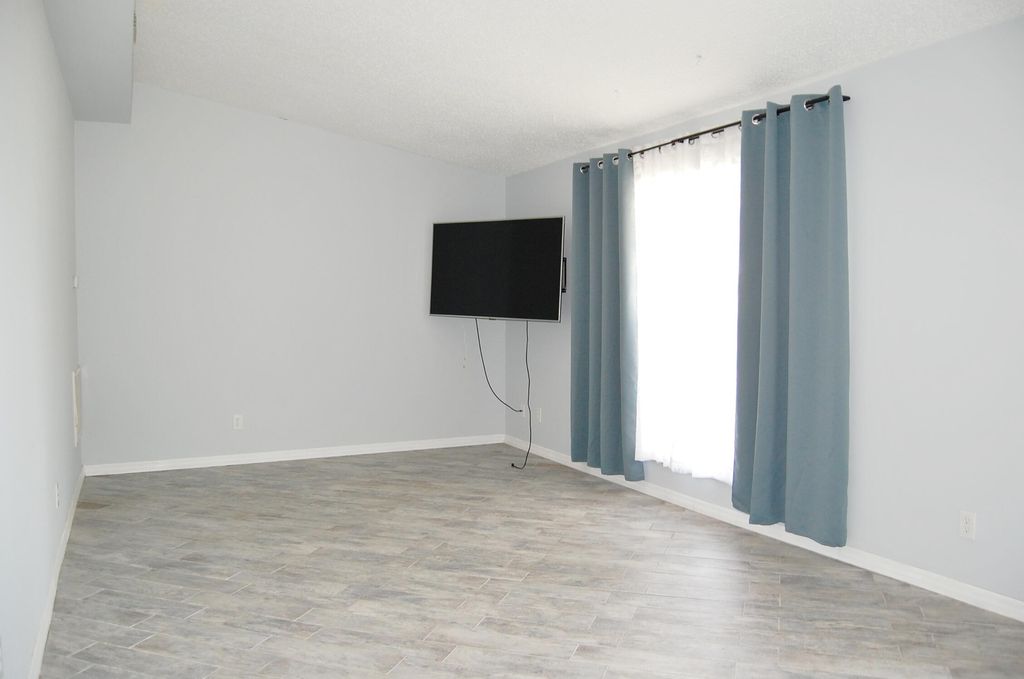 Photo of 1683 NE 24th Street, Jensen Beach, FL 34957 (MLS # R10974618)