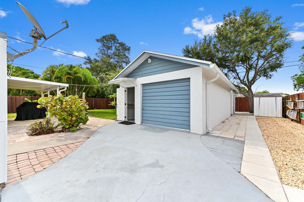 Photo of 522 Evergreen Drive, Lake Park, FL 33403 (MLS # R11096840)