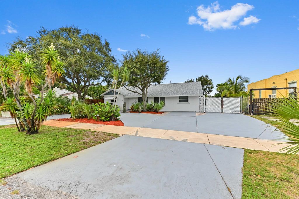 Photo of 522 Evergreen Drive, Lake Park, FL 33403 (MLS # R11096840)