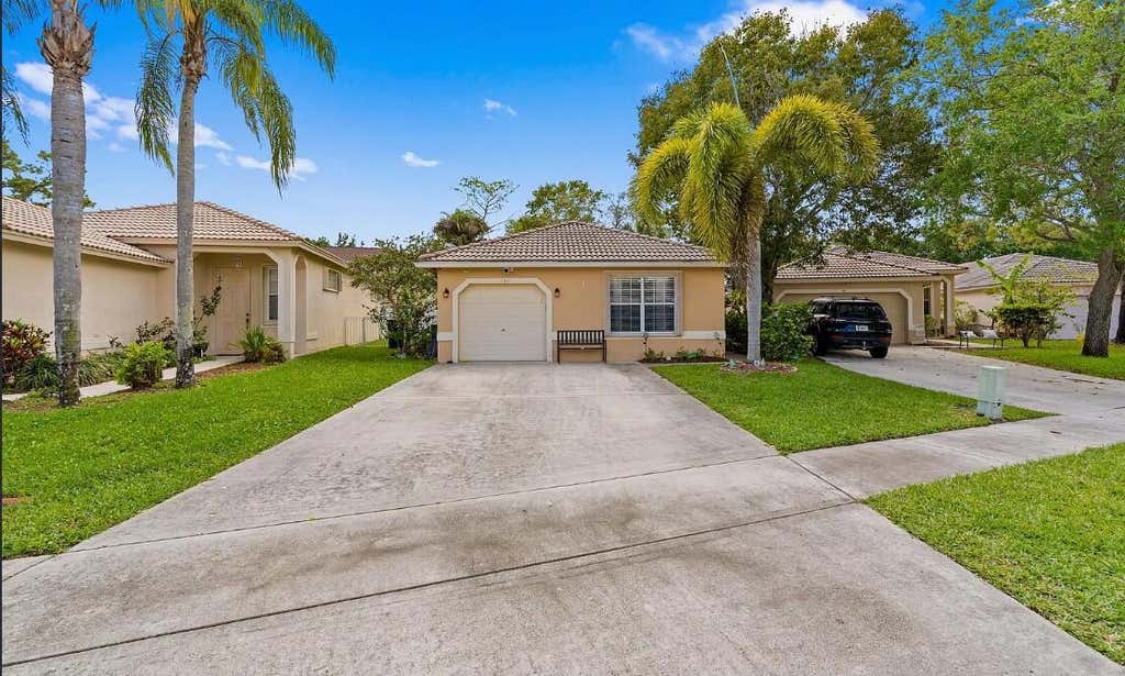 Photo of 121 Prestige Drive, Royal Palm Beach, FL 33411 (MLS # B26064899)