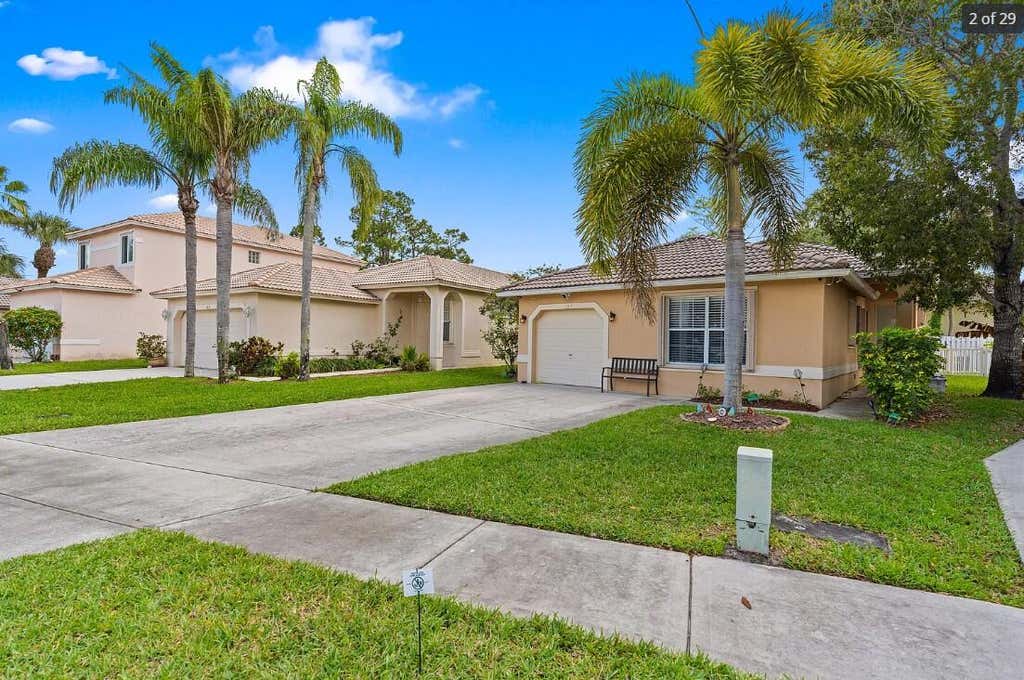 Photo of 121 Prestige Drive, Royal Palm Beach, FL 33411 (MLS # B26064899)