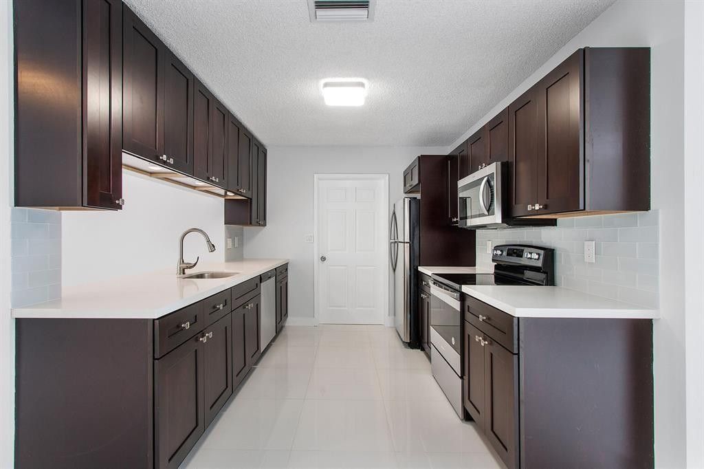 Photo of 9611 Saddlebrook Drive, Boca Raton, FL 33496 (MLS # F10555896)