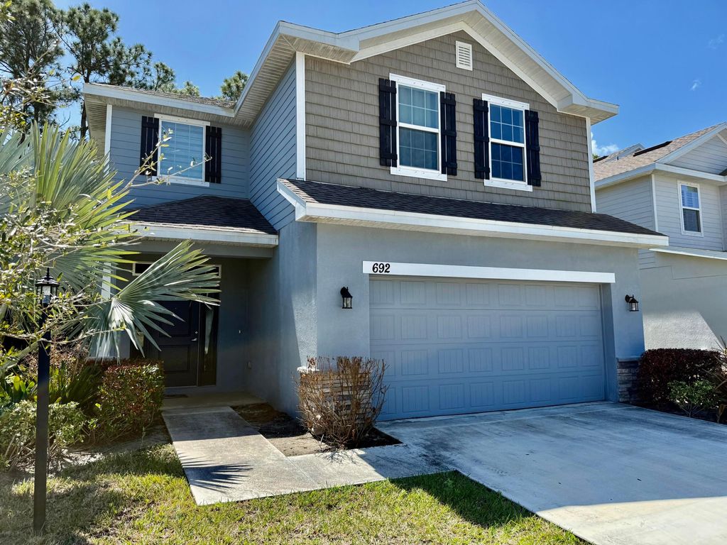 Photo of 692 NE Turtleback Trail, Port Saint Lucie, FL 34983 (MLS # B26001310)