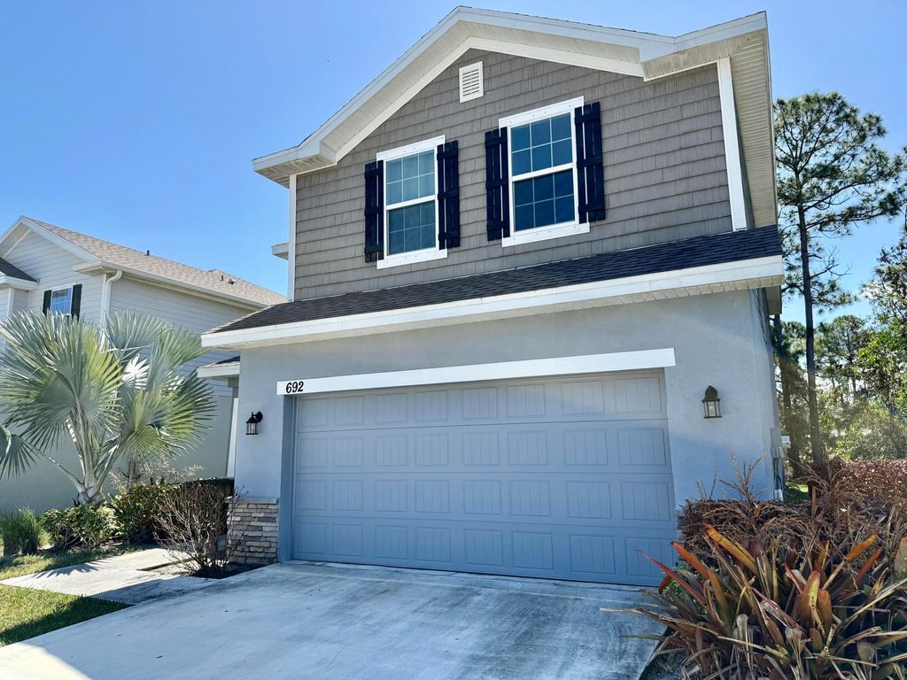 Photo of 692 NE Turtleback Trail, Port Saint Lucie, FL 34983 (MLS # B26001310)